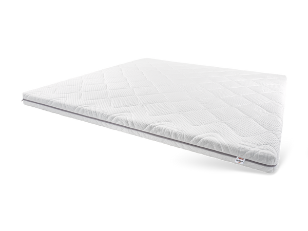Witte Tencel topdekmatras met ruitvormig stikpatroon, schuin van boven